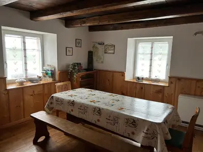 Un ou plusieurs lits dans un hébergement de l'établissement Gîte la Chenevière