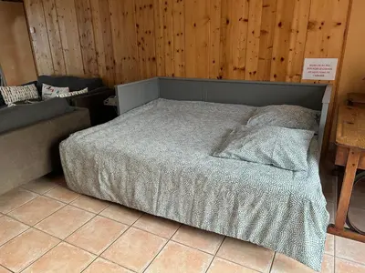 Un ou plusieurs lits dans un hébergement de l'établissement Gîte la Chenevière