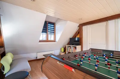 Salle de jeux dans l'établissement Aux charmes d'Alsace - Idéal groupes et familles