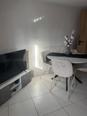 Télévision ou salle de divertissement dans l'établissement Lila's Home - Appartement dans maison avec extérieur