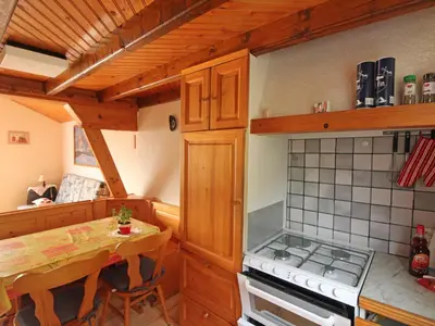 Cuisine ou kitchenette dans l'établissement Gîte charmant au cœur de Jussarupt - animaux OK - FR-1-589-847