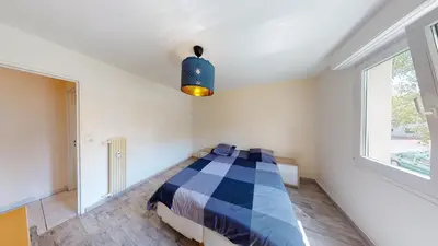 Un ou plusieurs lits dans un hébergement de l'établissement Appartement F4 refait proche université