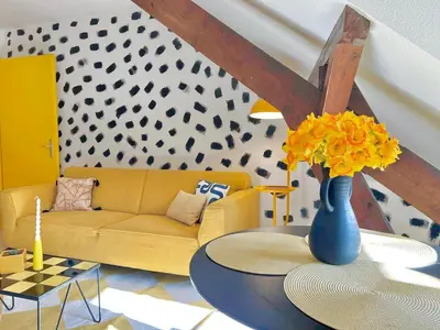 Coin salon dans l'établissement Yellow Suite - Design Stay for 3 - Alsace - Vosges