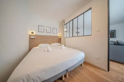Un ou plusieurs lits dans un hébergement de l'établissement La Sainte Anne Appartement 4 Pers Hyper Centre