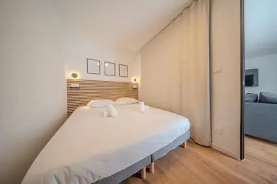 Un ou plusieurs lits dans un hébergement de l'établissement La Sainte Anne Appartement 4 Pers Hyper Centre