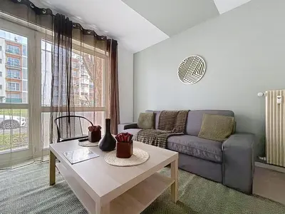 Coin salon dans l'établissement Appartement calme avec 2 chambres parking gratuit