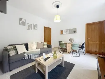 Coin salon dans l'établissement Appartement Le Paris jusqu'à 6 voyageurs