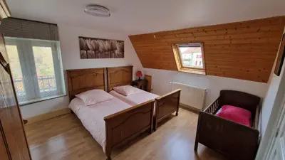 Un ou plusieurs lits dans un hébergement de l'établissement Gîte Eugénie