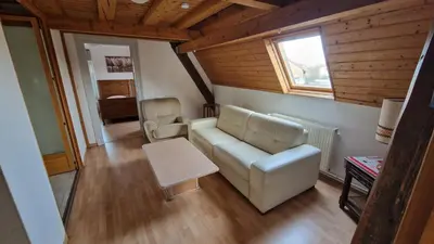 Coin salon dans l'établissement Gîte Eugénie