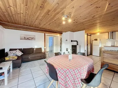 Coin salon dans l'établissement Appartement Au Calme