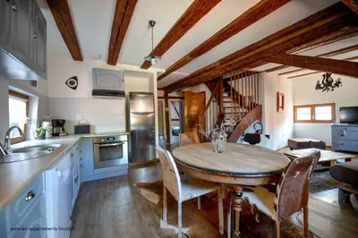 Cuisine ou kitchenette dans l'établissement Les Appartements De Louise