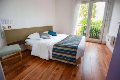 Un ou plusieurs lits dans un hébergement de l'établissement Contact Hotel Du Ladhof
