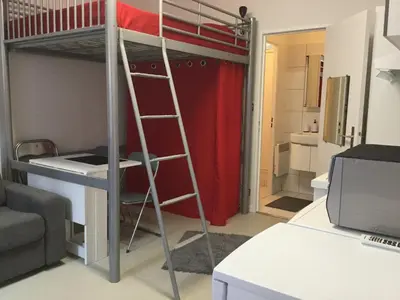 Un ou plusieurs lits dans un hébergement de l'établissement Studio sur cour au coeur de Colmar