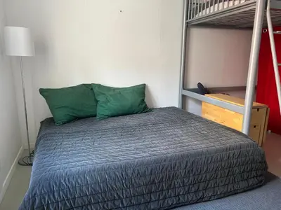 Un ou plusieurs lits dans un hébergement de l'établissement Studio sur cour au coeur de Colmar