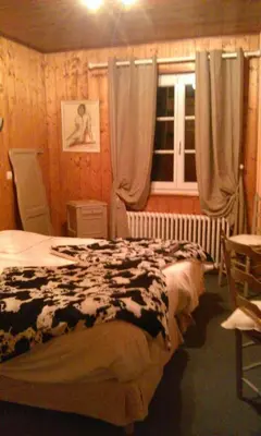 Un ou plusieurs lits dans un hébergement de l'établissement Hôtel La Vallée