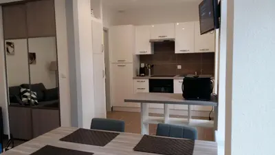 Cuisine ou kitchenette dans l'établissement Tripiers Duplex