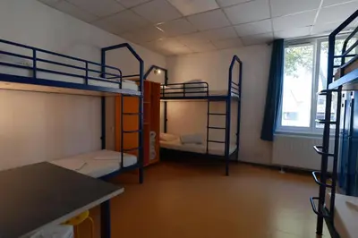 Un ou plusieurs lits superposés dans un hébergement de l'établissement Auberge de Jeunesse de Mulhouse