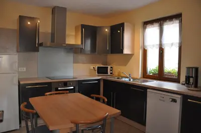 Cuisine ou kitchenette dans l'établissement Aux Grains Nobles