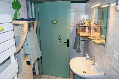 Salle de bains dans l'établissement Gite le GINKGO 50 M2