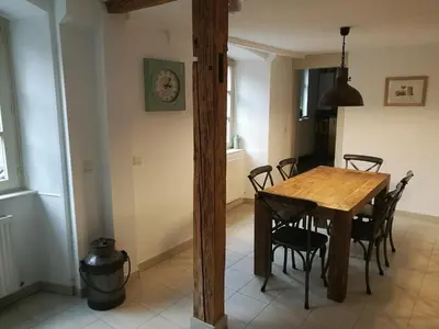 Télévision ou salle de divertissement dans l'établissement L'Appart du Vigneron