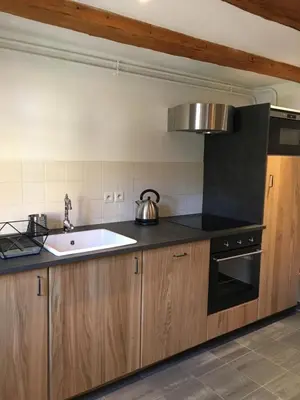 Cuisine ou kitchenette dans l'établissement L'Appart du Vigneron