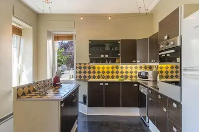 Cuisine ou kitchenette dans l'établissement Colmar Apartment