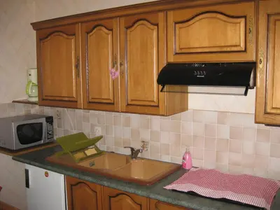 Cuisine ou kitchenette dans l'établissement Aux coeurs de la vallée