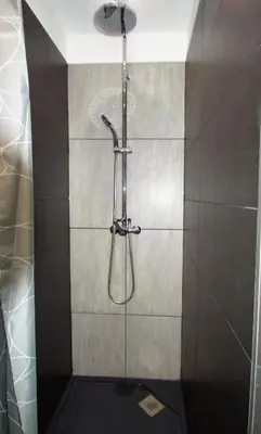 Salle de bains dans l'établissement Le 21