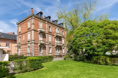 Jardin de l'établissement Luxueux Appartement Haussmannien Centre Ville