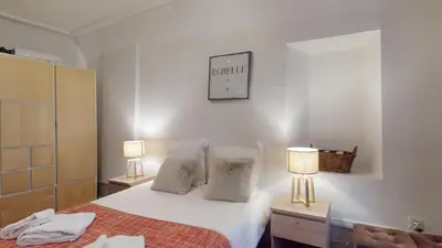 Un ou plusieurs lits dans un hébergement de l'établissement Appartements Porte Neuve