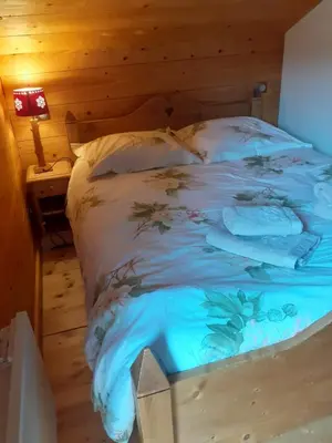 Un ou plusieurs lits dans un hébergement de l'établissement Chalet Elisa