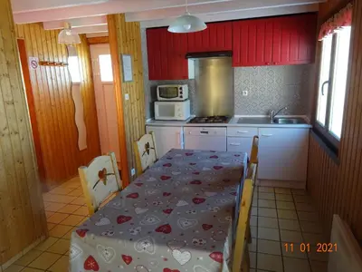 Cuisine ou kitchenette dans l'établissement La Bresse Hautes Vosges Chalet Le Podent