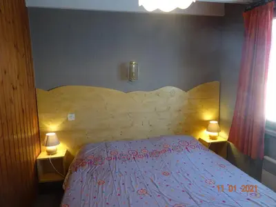 Un ou plusieurs lits dans un hébergement de l'établissement La Bresse Hautes Vosges Chalet Le Podent