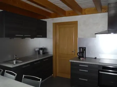 Cuisine ou kitchenette dans l'établissement Les jonquilles