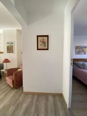 Un ou plusieurs lits dans un hébergement de l'établissement L'Ours de Colmar - Appartements en centre ville