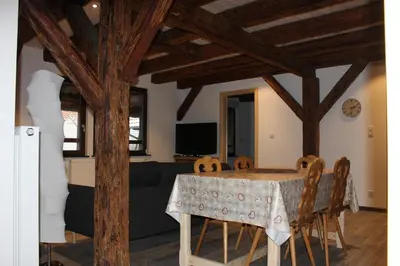Télévision ou salle de divertissement dans l'établissement Gîte de l'ours grognon