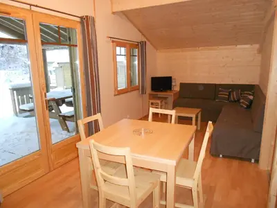 Télévision ou salle de divertissement dans l'établissement Camping du Ô des bluches