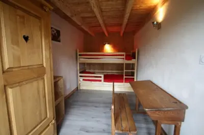 Un ou plusieurs lits dans un hébergement de l'établissement Gîte du Poirier