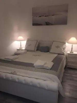 Un ou plusieurs lits dans un hébergement de l'établissement Apartments Center Colmar 5