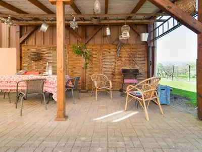 Terrasse ou espace extérieur de l'établissement Au pré des Poulains