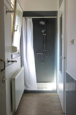 Salle de bains dans l'établissement Le Jules