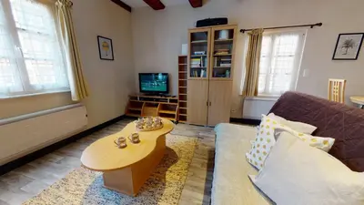 Télévision ou salle de divertissement dans l'établissement Aux Bijoux De Colmar - 1 Parking Gratuit