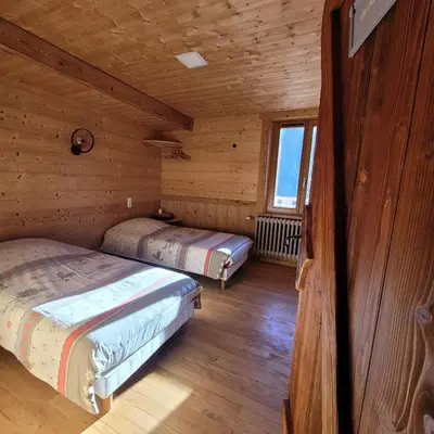 Un ou plusieurs lits dans un hébergement de l'établissement chalet des cyclistes