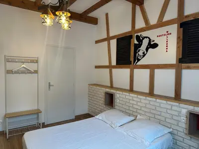 Un ou plusieurs lits dans un hébergement de l'établissement Hotel Porte de France - Self Check In by Homenhancement