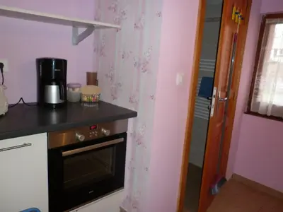 Cuisine ou kitchenette dans l'établissement Gites Petermann