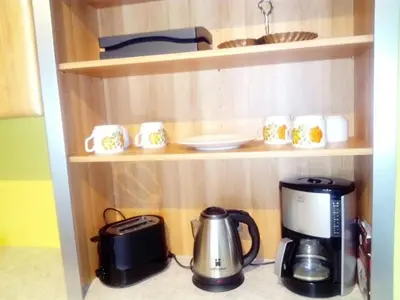 Cuisine ou kitchenette dans l'établissement Gîte 
