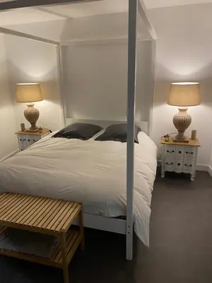 Un ou plusieurs lits dans un hébergement de l'établissement Suites Residences Spa