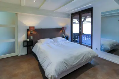 Un ou plusieurs lits dans un hébergement de l'établissement Suites Residences Spa