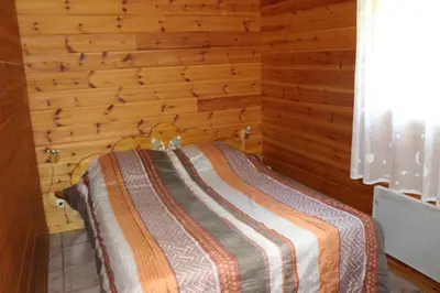 Un ou plusieurs lits dans un hébergement de l'établissement chalets de la Soyotte