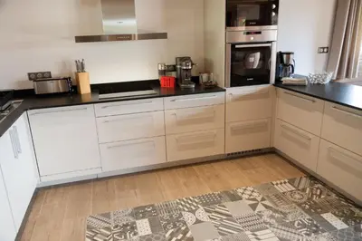 Cuisine ou kitchenette dans l'établissement La Cabane de Tim